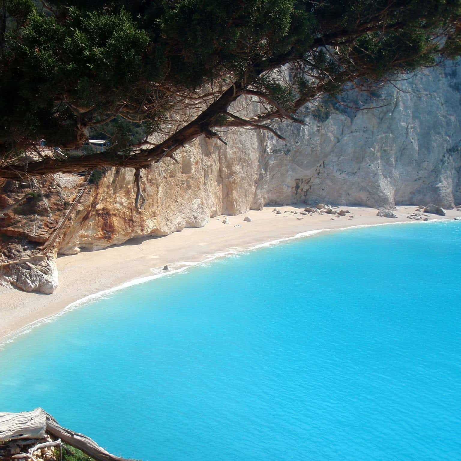 Beautiful beach with turquoise waters and cliffs in Lefkada, Greece.